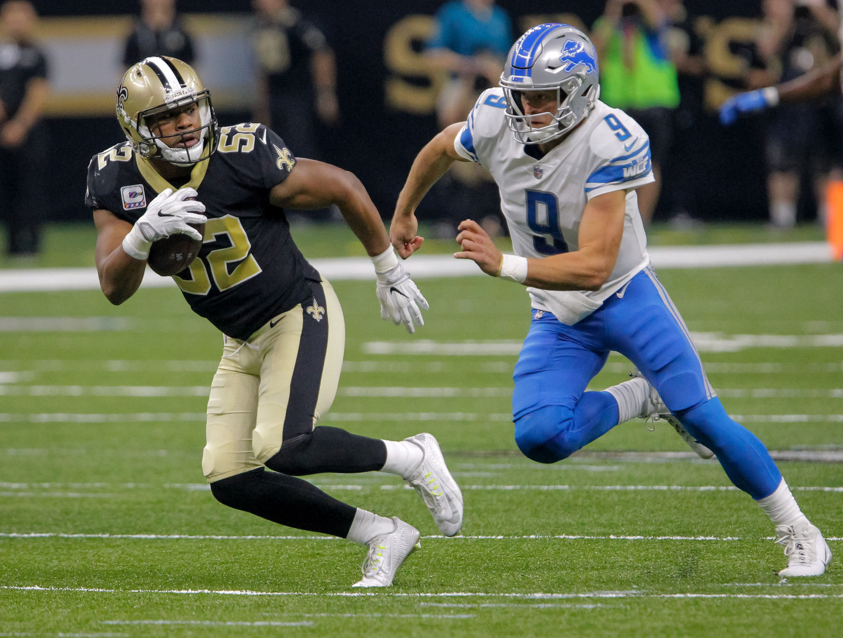 SECOND QUARTER - Saints' Craig Robertson strips ball, scoops it up